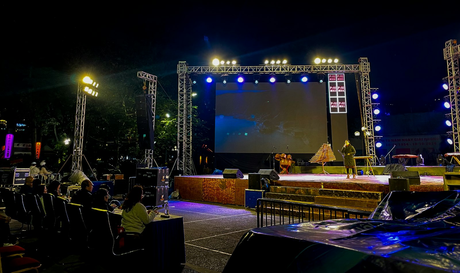 Outdoor festival stage with lighting