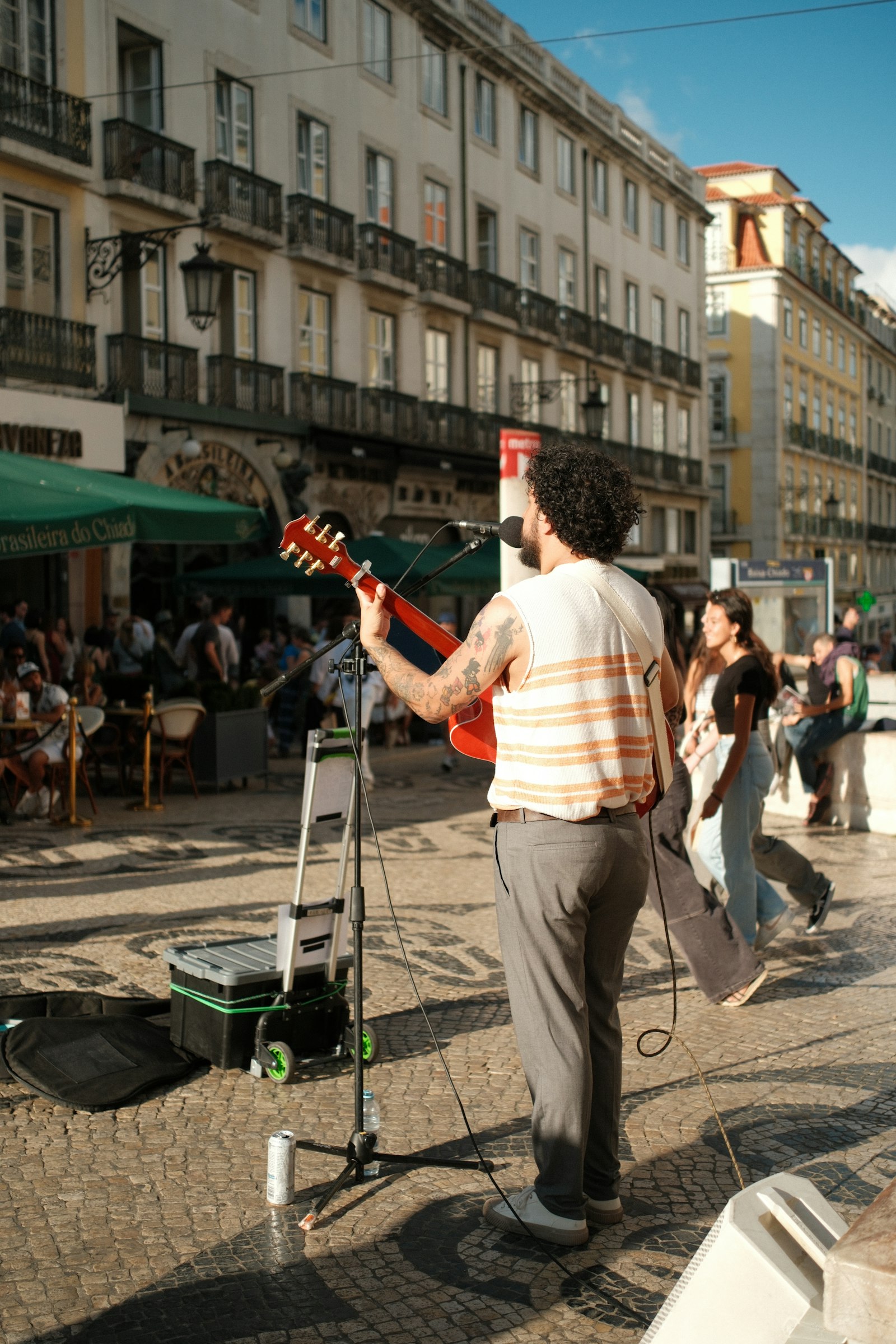 Street musician performing on a city square